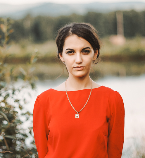 young woman in a red dress photo